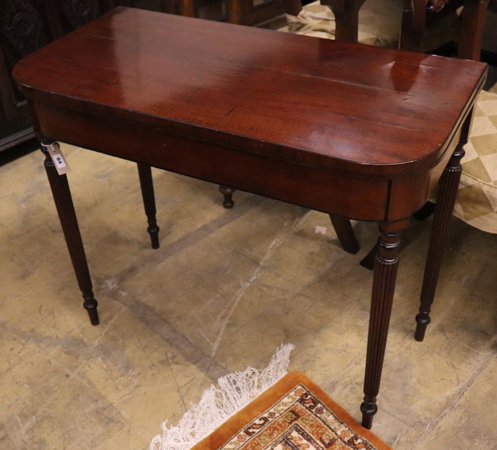 A Regency mahogany folding card table, width 91cm, depth 45cm, height 75cm